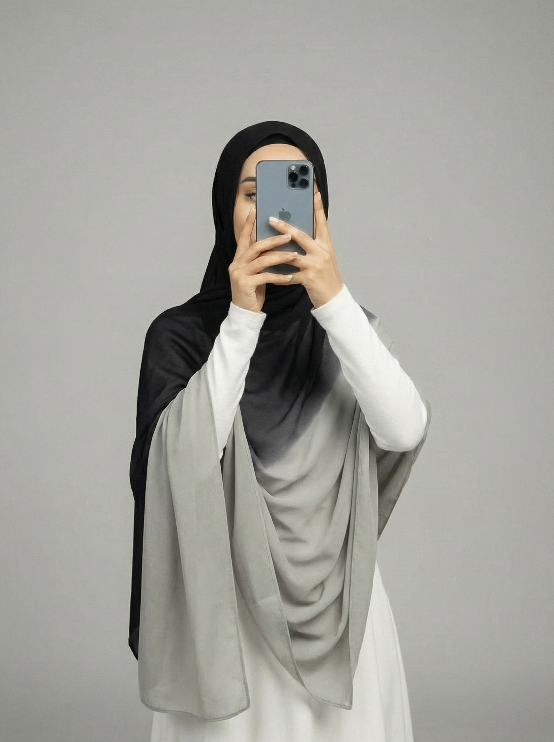 Ombre viscose modal hijab in two-toned colors, featuring a soft, lightweight fabric with a smooth drape for elegant and comfortable wear.