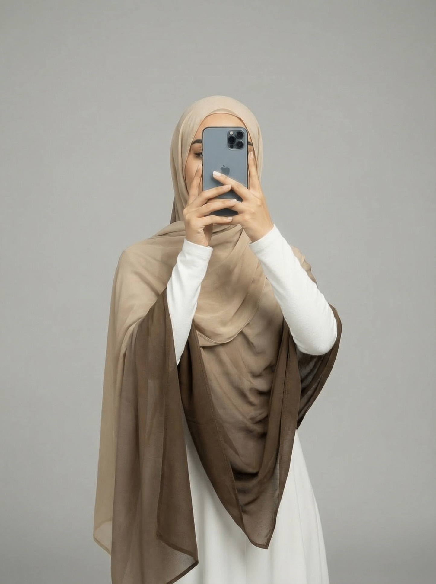 Ombre viscose modal hijab in two-toned colors, featuring a soft, lightweight fabric with a smooth drape for elegant and comfortable wear.