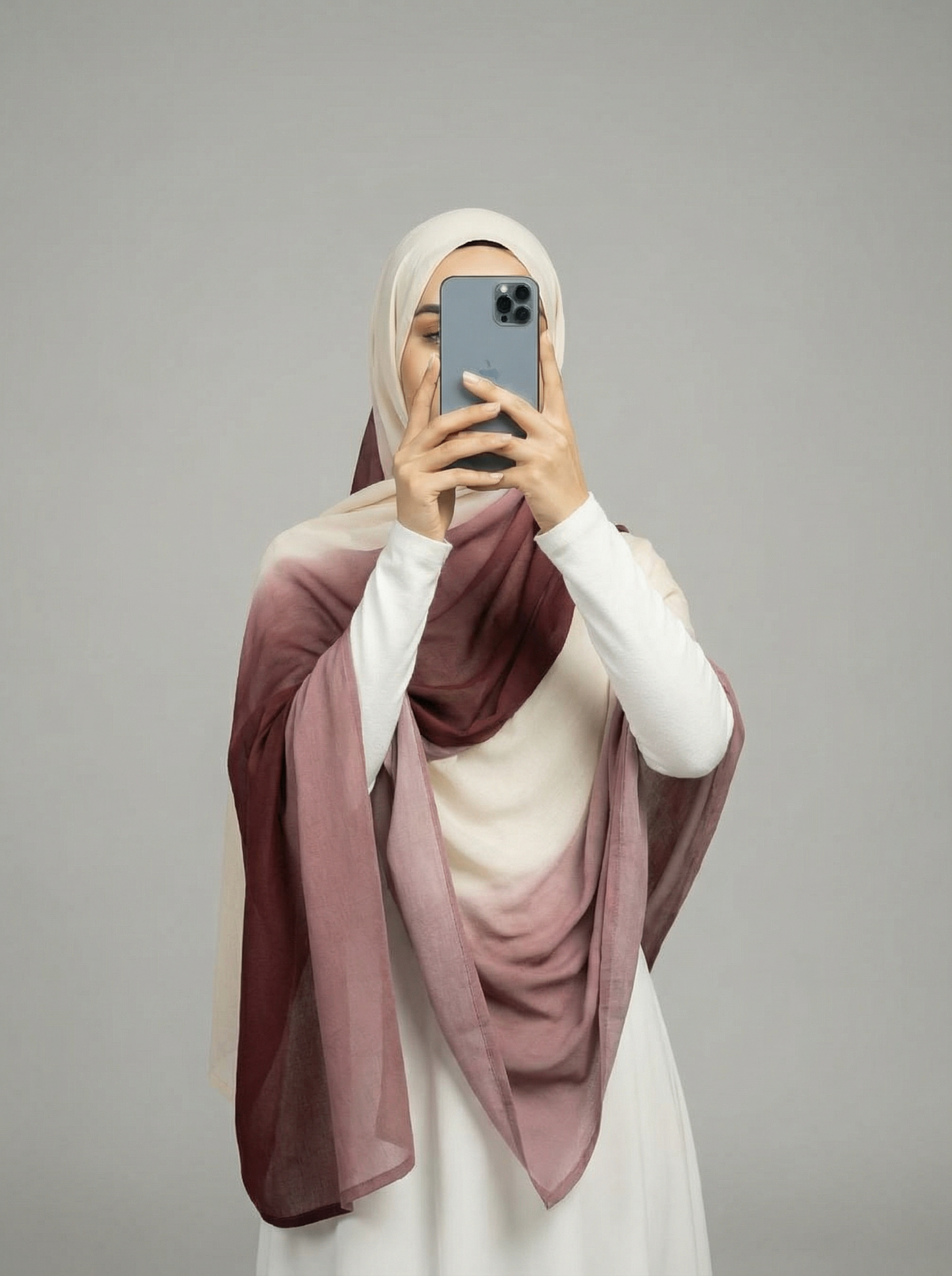 Ombre viscose modal hijab in two-toned colors, featuring a soft, lightweight fabric with a smooth drape for elegant and comfortable wear.