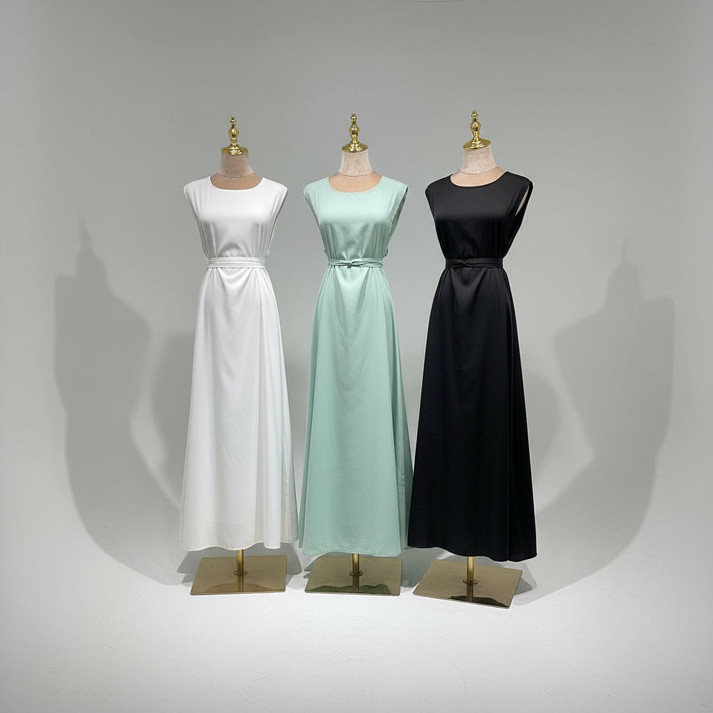 Women’s sleeveless inner dress in various colors, made from soft and breathable Nida fabric, perfect for modest and comfortable wear.