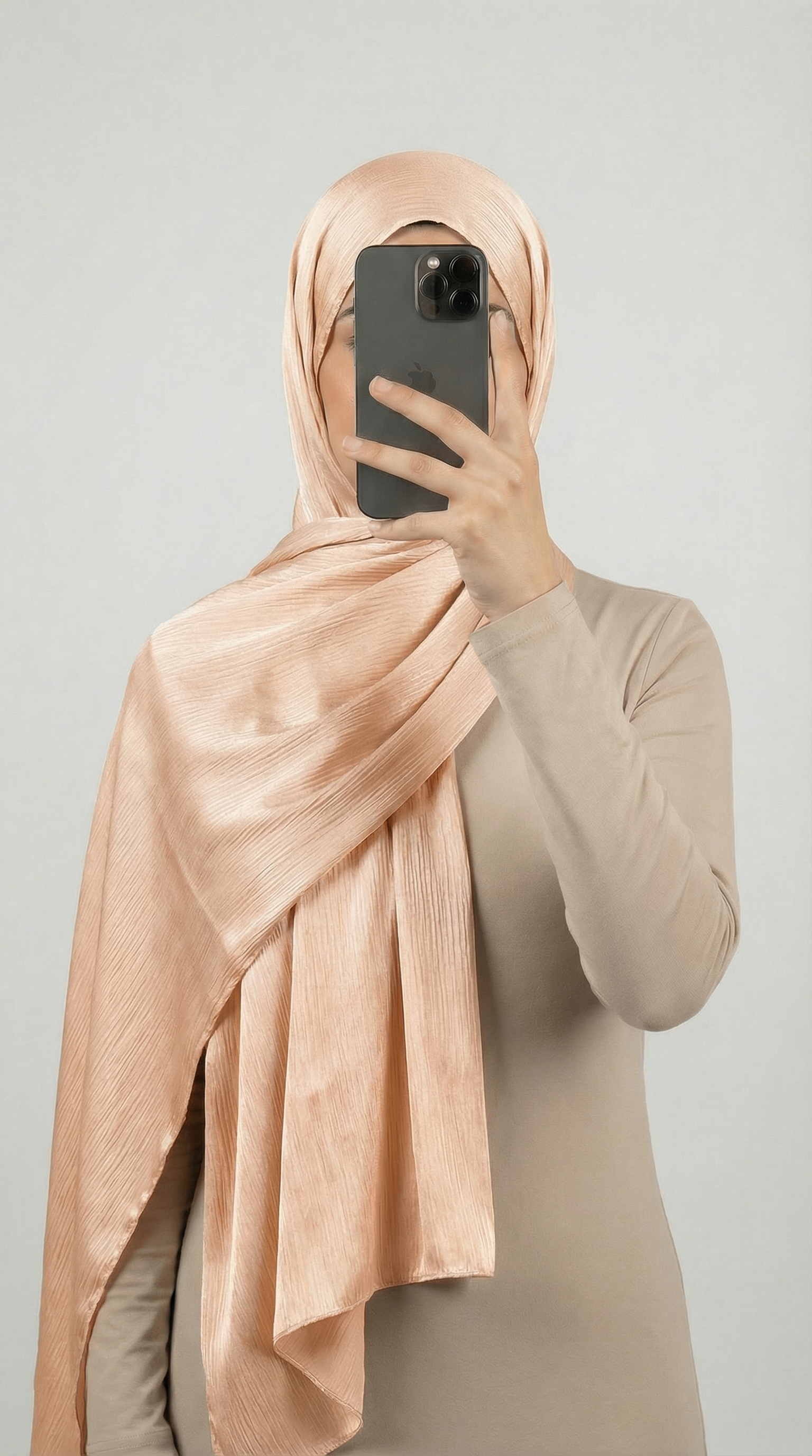 Crinkle textured satin hijab in elegant colors, featuring a soft, lightweight fabric with a stylish textured finish for graceful draping and comfortable wear.