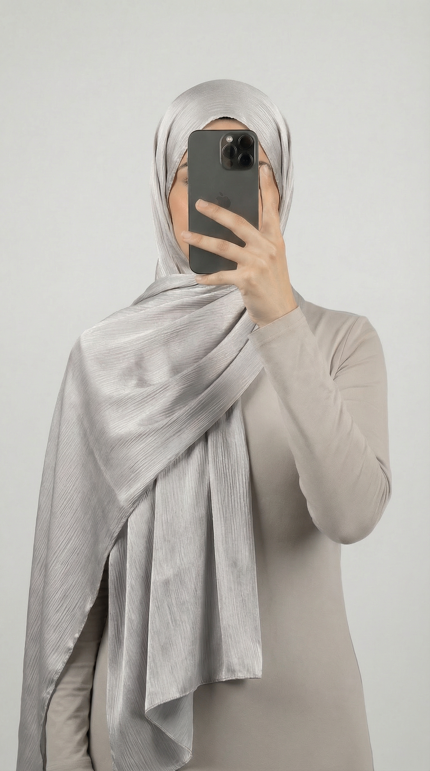 Crinkle textured satin hijab in elegant colors, featuring a soft, lightweight fabric with a stylish textured finish for graceful draping and comfortable wear.