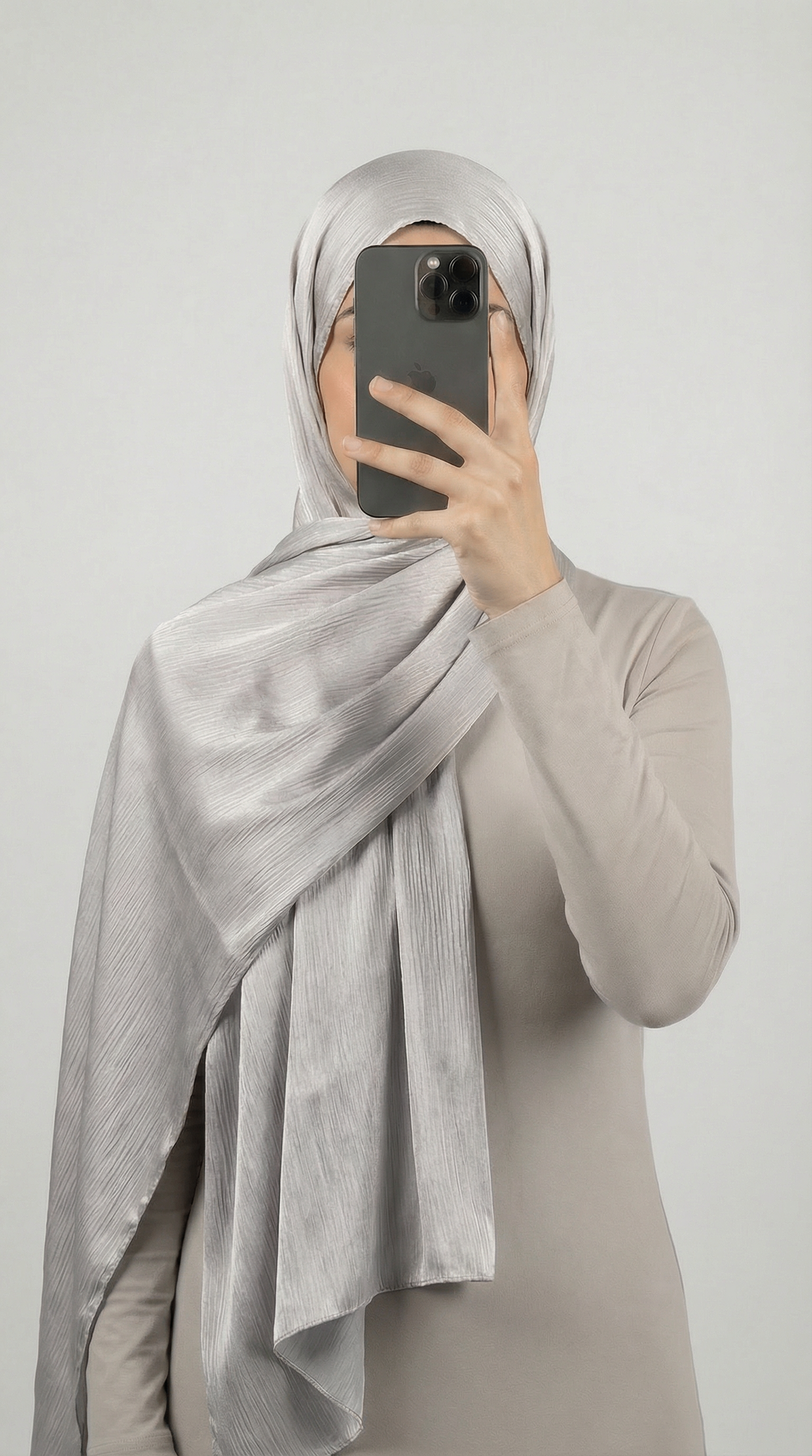 Crinkle textured satin hijab in elegant colors, featuring a soft, lightweight fabric with a stylish textured finish for graceful draping and comfortable wear.