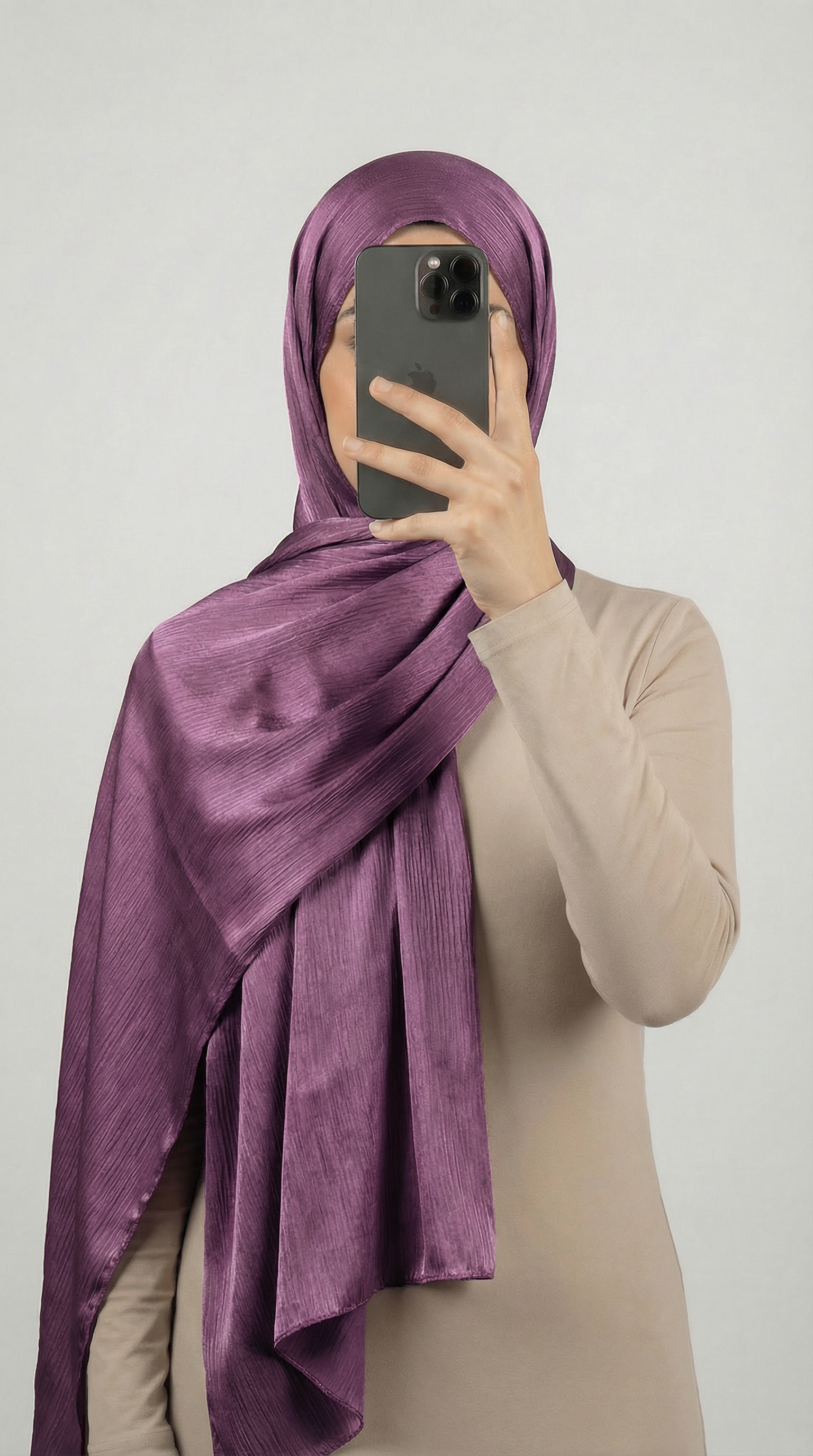 Crinkle textured satin hijab in elegant colors, featuring a soft, lightweight fabric with a stylish textured finish for graceful draping and comfortable wear.
