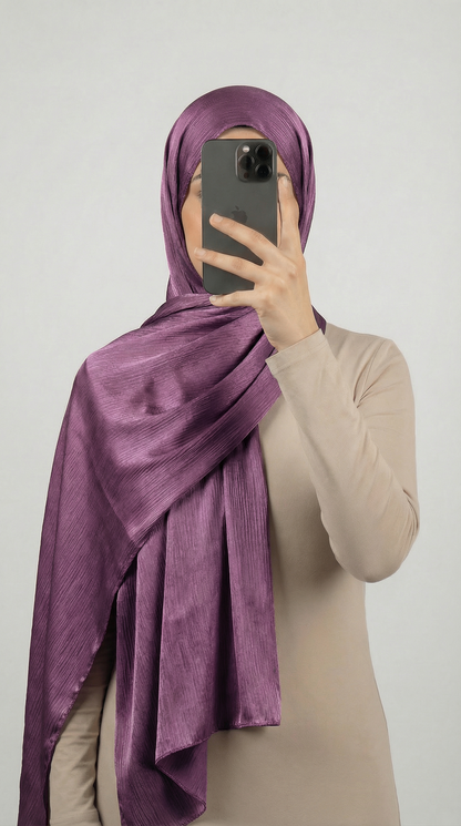 Crinkle textured satin hijab in elegant colors, featuring a soft, lightweight fabric with a stylish textured finish for graceful draping and comfortable wear.