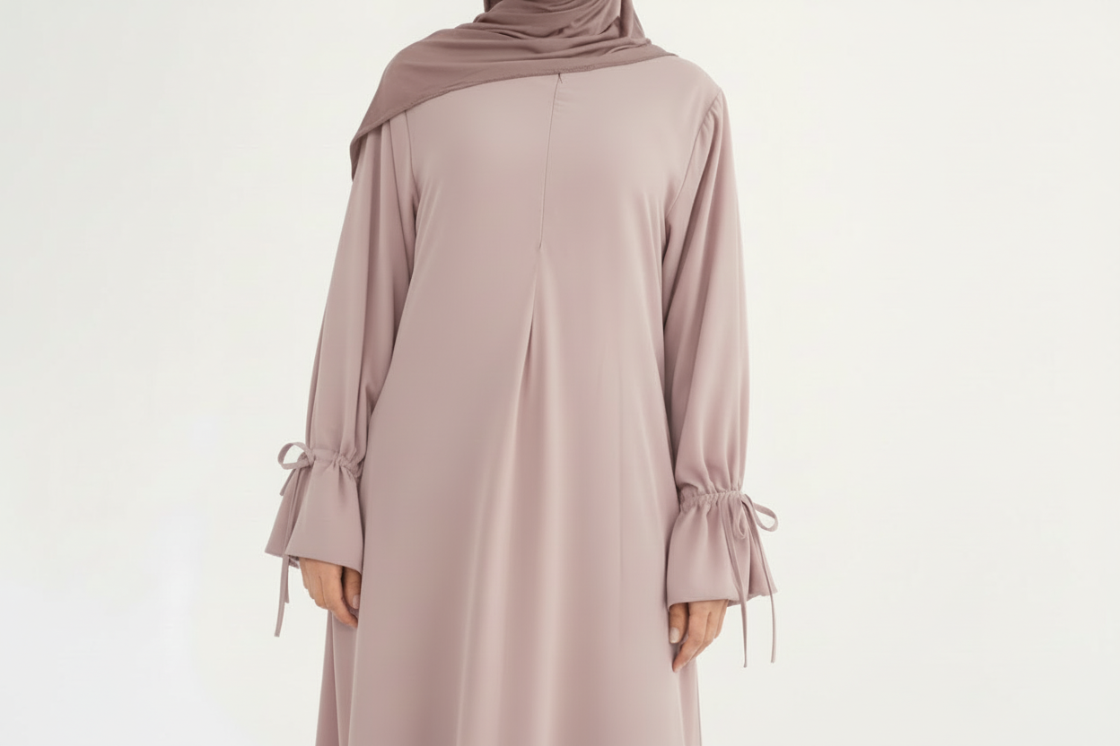 Mauve long-sleeve dress with a matching hijab on a white background