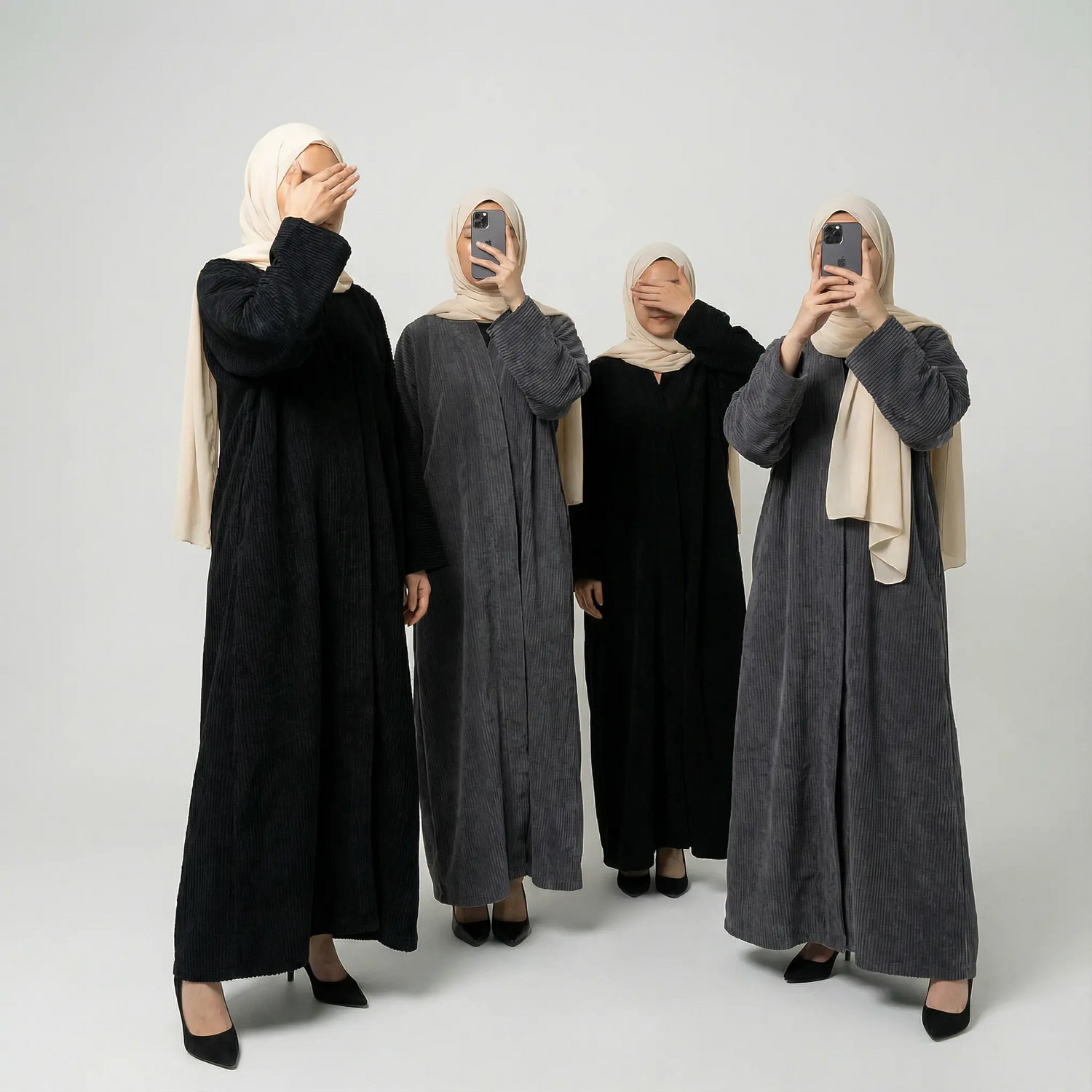 Discover Noor &amp; Grace Winter Collection: stylish, warm, and modest abayas crafted for comfort and elegance. Perfect for everyday wear and special occasions. Five women wearing hijabs and long dresses on a white background.