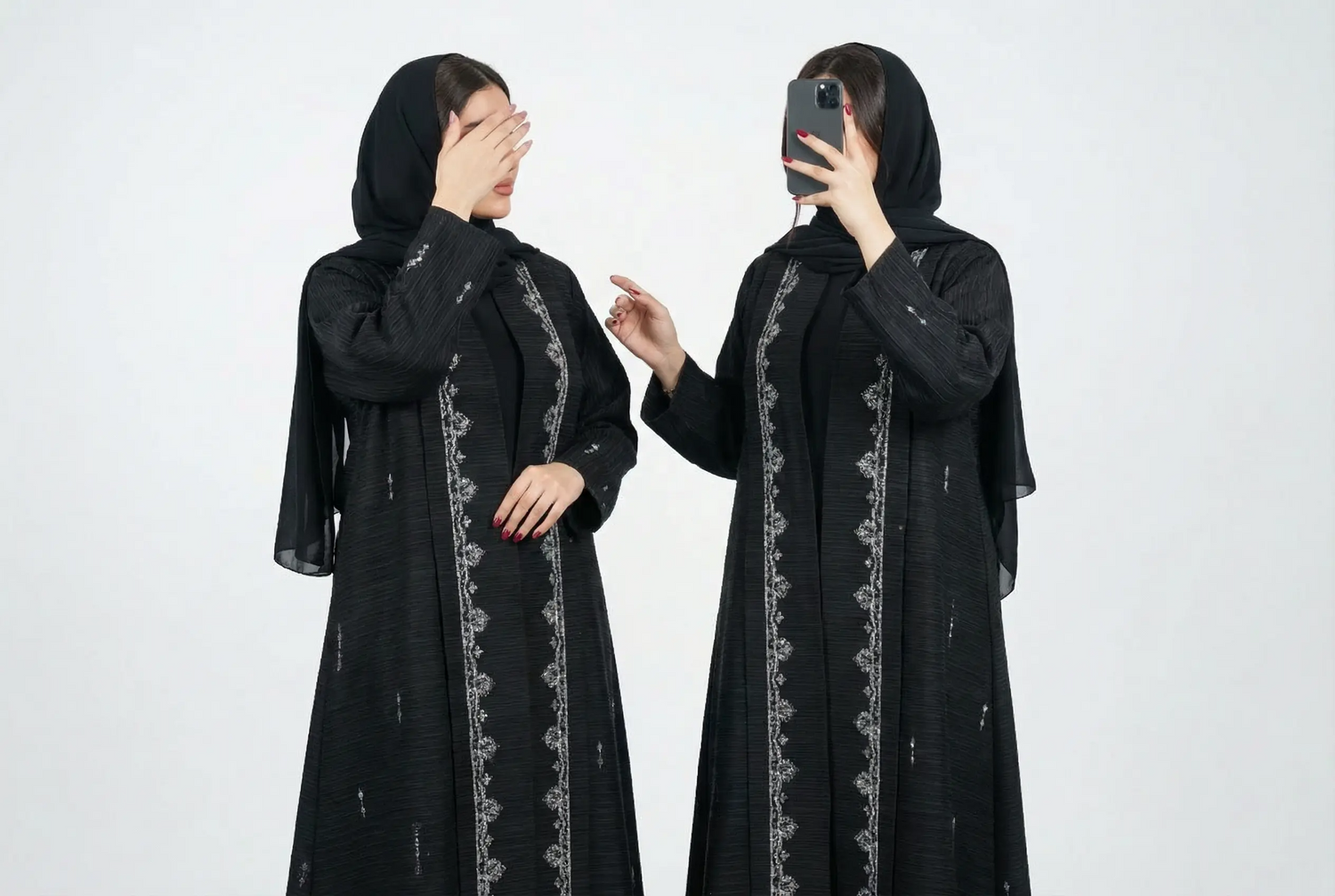 Noor & Grace Abayas and Hijabs - Buy affordable abayas online. Two women wearing black abayas with white embroidery on a white background.