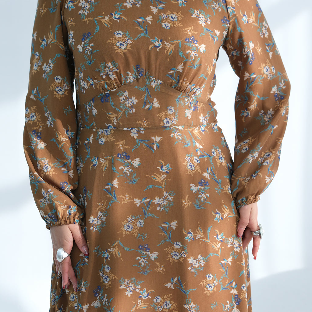 Brown floral dress on a white background