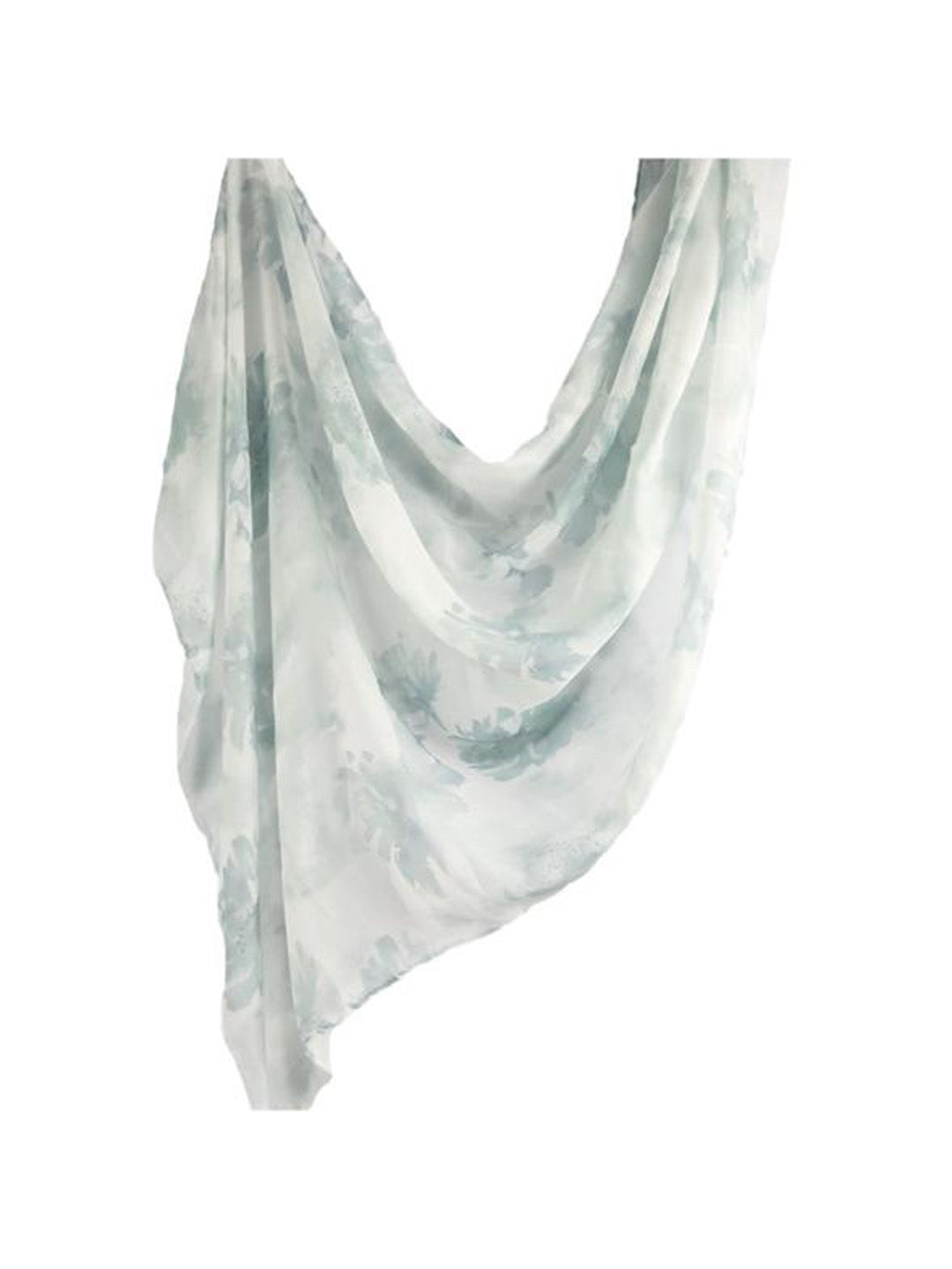 A lightweight, semi-sheer scarf with a watercolor-style abstract print in soft sage green and white, draped against a solid white background.